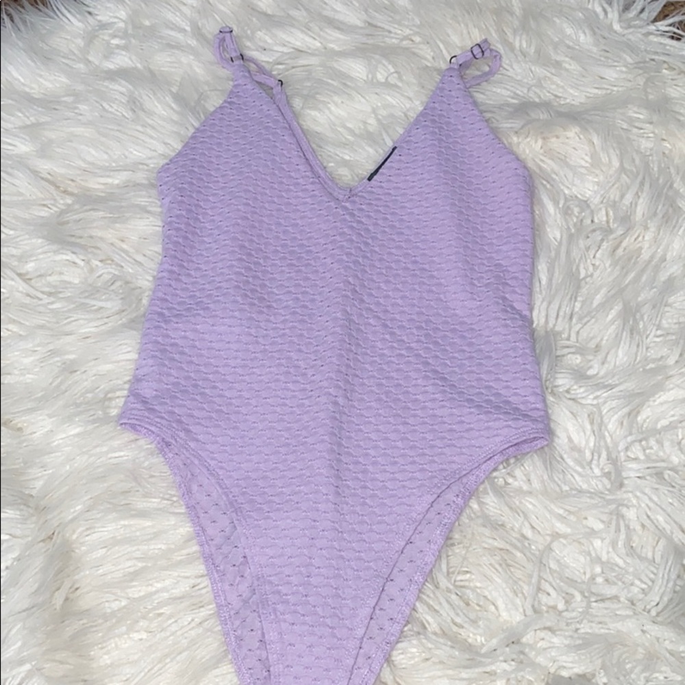 light purple bodysuit